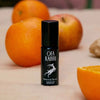 Ofa Karri Seasonal Boost Immunity Roll-on - product shown near oranges