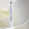 Lifestyle shot of Chantecaille Blanc Peony Eye Serum Dark Spot Corrector (15 ml)