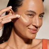 Minori Daily Mineral Face Sunscreen - Spf 30 - model shown putting product on face