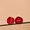 Minori Cream Blush Mini - Scarlet - product and cap shown on glass
