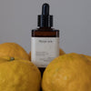 HYEJA Yuja Vitamin C Brightening Serum - product shown with fruit