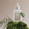 HYEJA Heartleaf Niacinamide Calming Serum - product shown behind plants