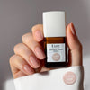 Kure Bazaar Le Vernis Serum Rose - Le Rose 05 (10 ml) - model shown holding product