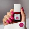 Kure Bazaar Le Vernis Serum Rose - Le Rose 04 (10 ml) - model shown holding product