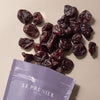Le Prunier California Organic Dried Plums - products shown spilling out of bag