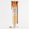 Versatile Paris Moisturizing Hand Cream - La Creme Caramel - product shown with caramel dripping down it