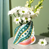 Octaevo Mini Paper Vase Pearl Shell - product shown with flowers inside it