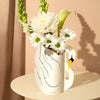 Octaevo Mini Paper Vase Swan - product shown with flowers in it