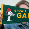 Three Potato Four 3P4 X Peanuts Pennant - Grow a Garden - model shown holding product