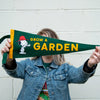 Three Potato Four 3P4 X Peanuts Pennant - Grow a Garden - model shown holding product