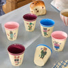 Rice By Rice Set of 6 Small Melamine Cups - Nathalie Lete Print - all six products shown on table with pastry