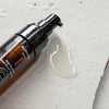 Ruhaku Gettou Night Repair Oil - product shown next to product liquid swatch