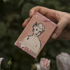 Archivist Hand Soap Bar - Cherry Blossom - model shown holding product near flowers