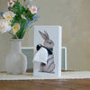 Beyond123 Wonder Rabbit Tissue Box - product shown next to vase of flowers on table