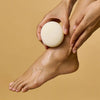 Kate McLeod Foot Stone Solid Foot Moisturizer - model shown using product on foot