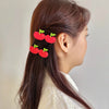Centinelle Apples Alligator Hair Clip - model shown wearing product in hair