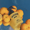 Collins Namhae Yuja Room Spray (200 ml) surrounded by lemons on a blue background