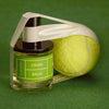 Lifestyle shot of D.S. & Durga Crush Balls Eau de Parfum (50 ml) wrapped with white ribbon with tennis ball