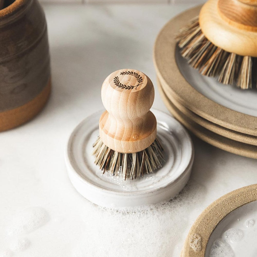 Farmhouse Pottery Laurel Pot Brush Set shown with soap suds