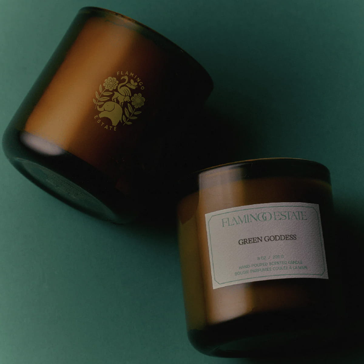 Flamingo Estate Green Goddess Candle (226 g) - product shown on green background.