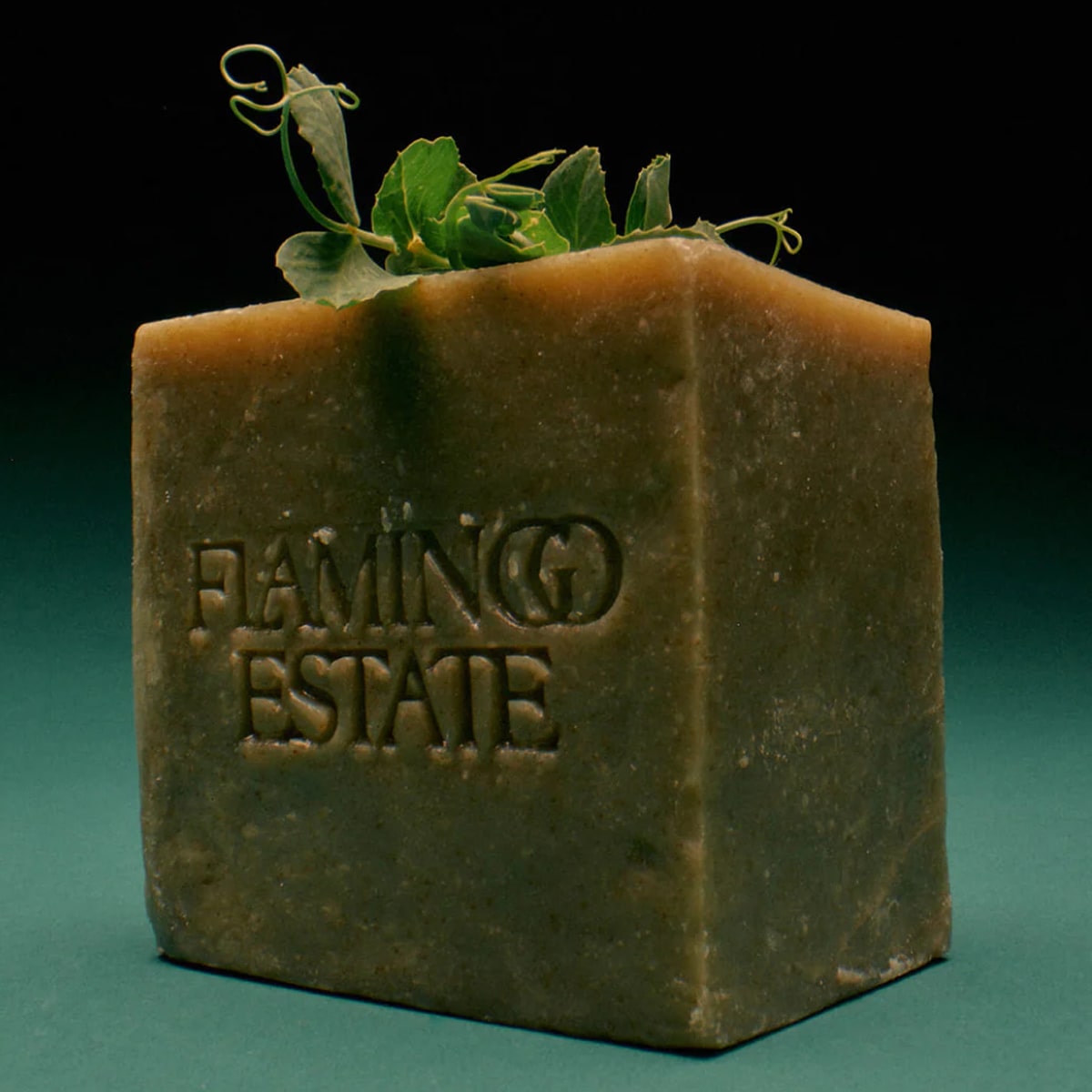 Flamingo Estate Green Goddess Bar Soap - bar soap shown with leaves on top