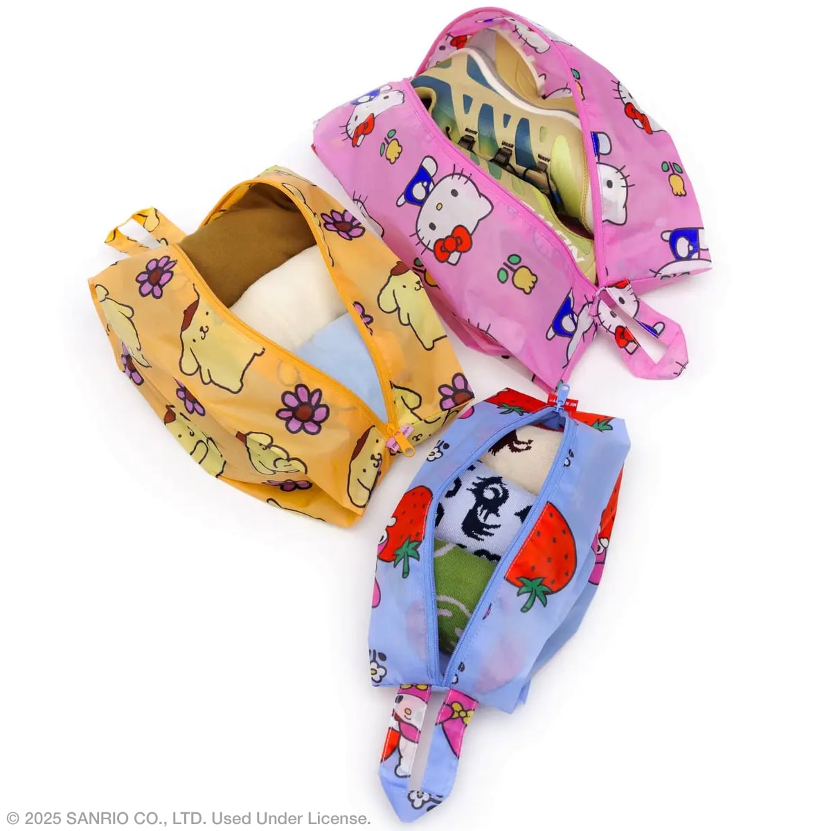 Baggu 3D Zip Set – Hello Kitty and Friends Florals showing all 3 bags unzipped with possible items inside.