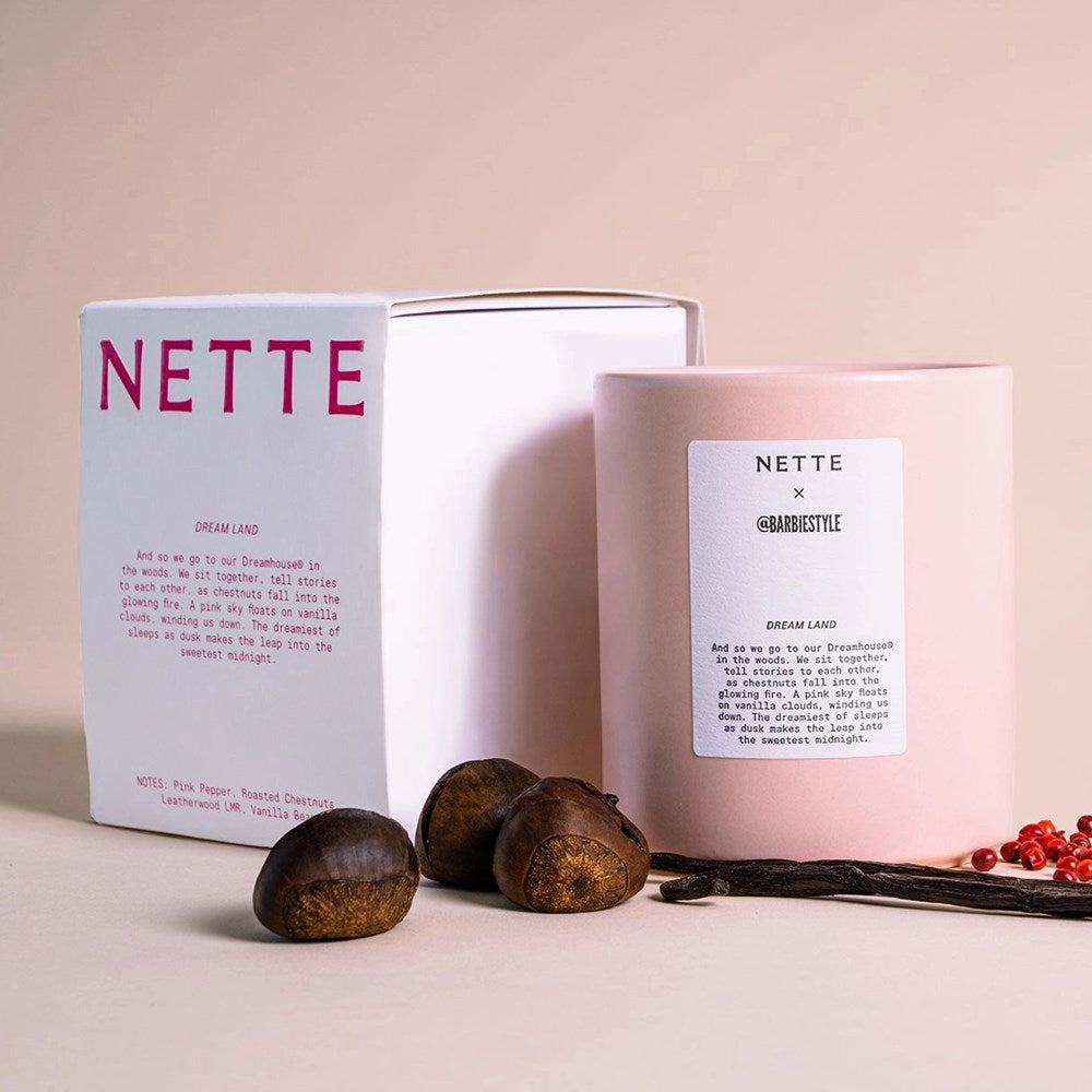 NETTE x @BARBIESTYLE Dream Land Scented Candle - product shown next to box with chestnuts and vanilla bean