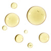 Ursa Major Golden Hour Dry Oil - product droplets shown