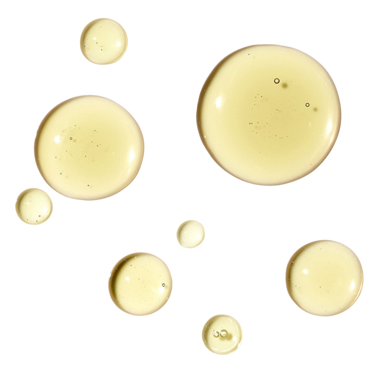 Ursa Major Golden Hour Dry Oil - product droplets shown