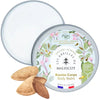 Les Abeilles de Malescot Honey Body Balm - Almond - product shown open next to almonds