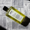 C.O. Bigelow Lime & Coriander Body Cleanser (10 oz) on a newspaper background