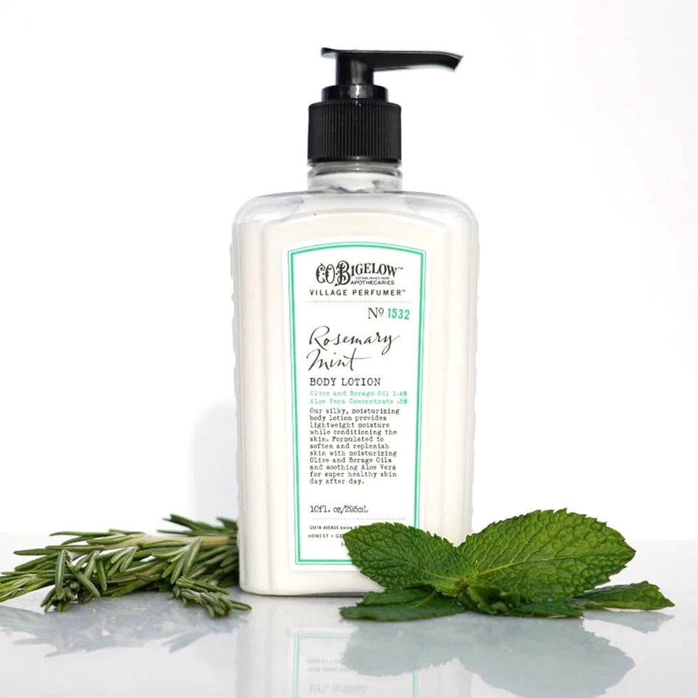 C.O. Bigelow Rosemary Mint Body Lotion (10 ml) with rosemary and mint leaves on a white background