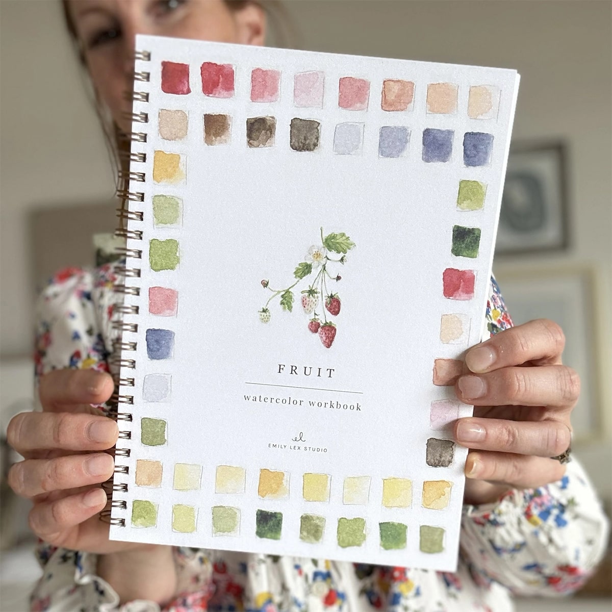 Emily Lex Studio Fruit Watercolor Workbook -front of product shown in hands