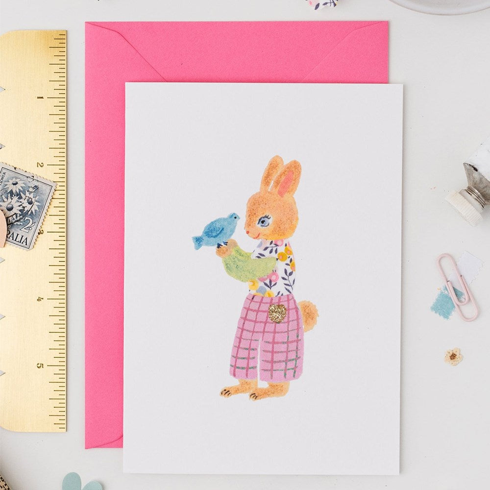 The Charming Press Rabbit Card - front of product shown on envelope next to ruler and paperclip