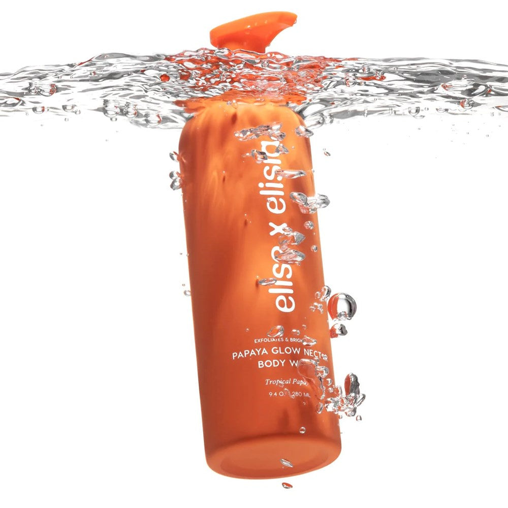 Elise x Elisia Papaya Glow Nectar Body Wash (9.4 oz) half submerged under water
