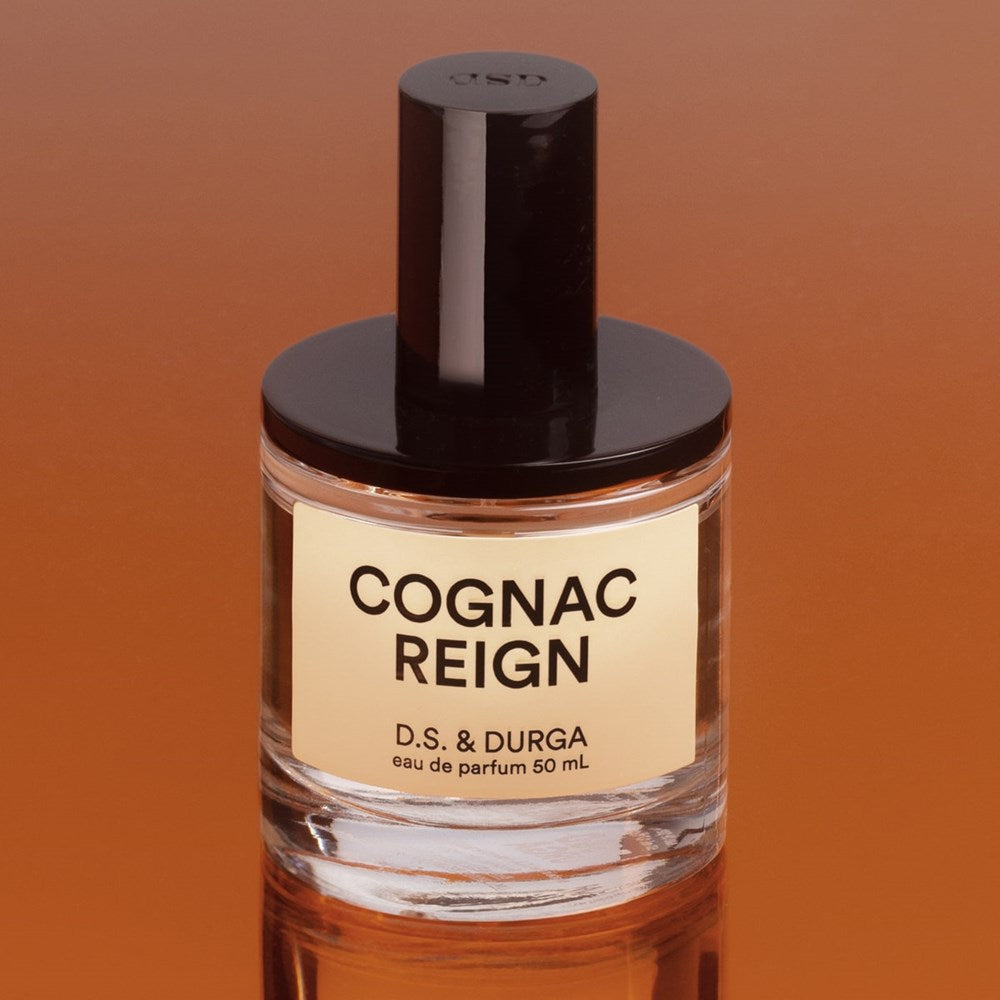 D. S. & Durga Cognac Reign Eau de Parfum (50 ml) - shown on dark orange background