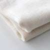 IPPINKA Nawrap Organic Cotton Face Towel - Ivory (1 pc) - product material shown close up