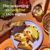 Diaspora Co Taco Masala (1.4 oz)  - tacos on a plate shown with sides in the background