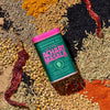 Diaspora Co Nik's Achari Masala (1.9 oz) - product shown with spices in the background