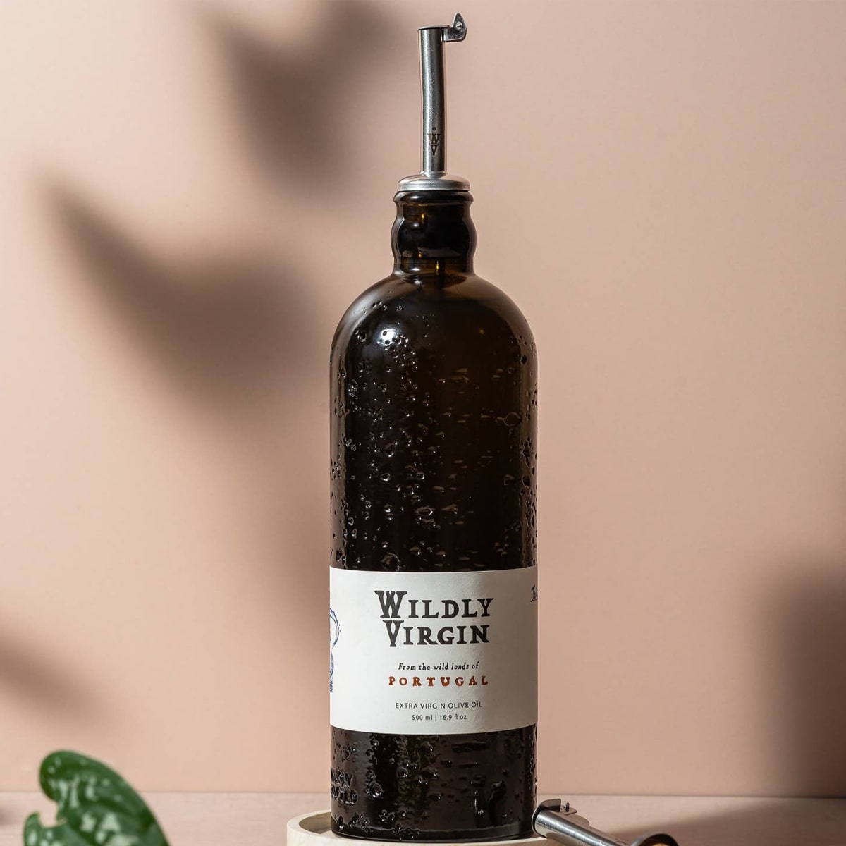 Wildly Virgin Joaquim’s Reserve Olive Oil (16.9 oz) & Pour Spout (1 pc) - Pour spout and bottle shown together on beige background.