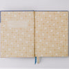 Good Juju Ink Blue Bell Folk Pattern Hardcover Notebook (1 pc) - Product's inside cover shown in entirety.