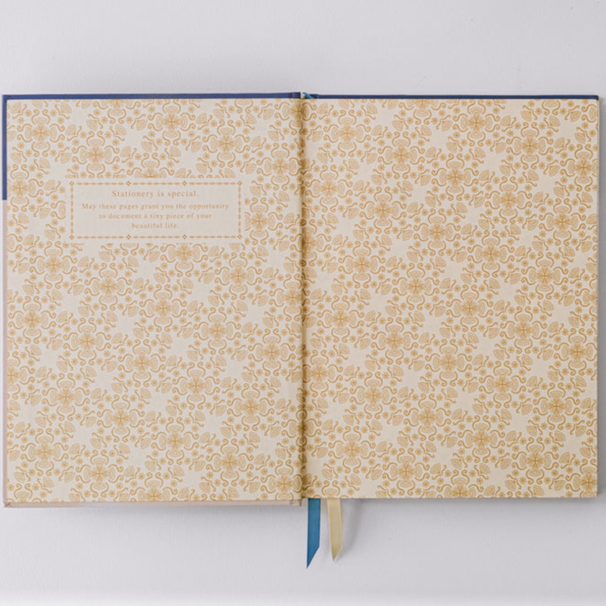 Good Juju Ink Blue Bell Folk Pattern Hardcover Notebook (1 pc) - Product's inside cover shown in entirety.