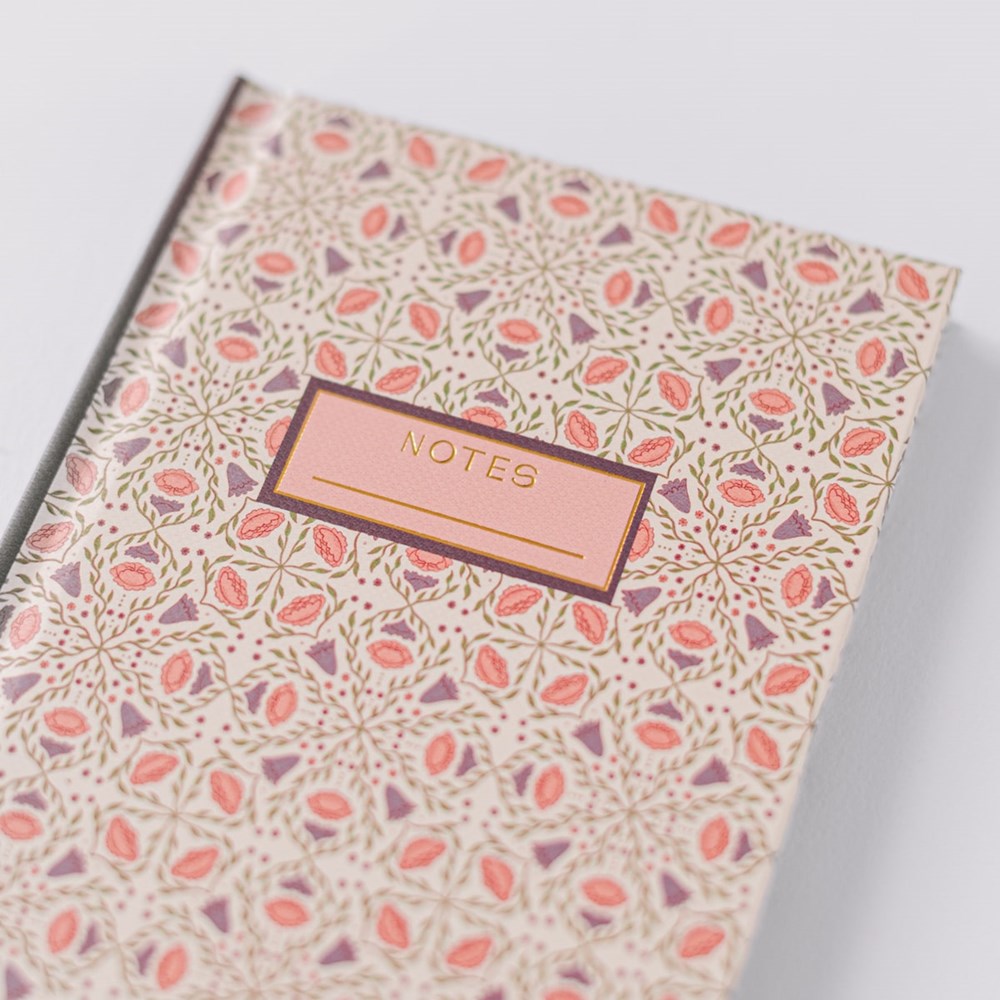 Good Juju Ink Ivory Folk Pattern Pocket Journal (1 pc) - Front of product shown zoomed in on white background. 