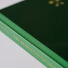Good Juju Ink Moss Le Grand Livre Hardcover Notebook (1 pc) - Product shown close up on binding. 