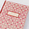 Good Juju Ink Pink Folk Pattern Pocket Journal (1 pc) - Front cover shown zoomed in.