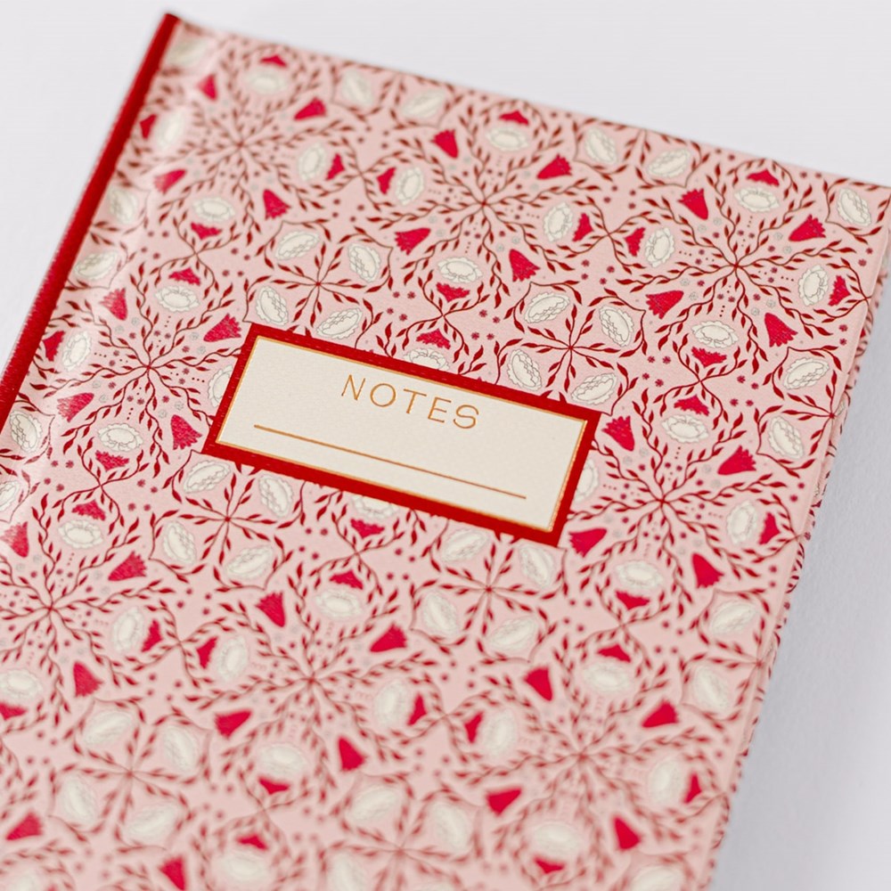 Good Juju Ink Pink Folk Pattern Pocket Journal (1 pc) - Front cover shown zoomed in.