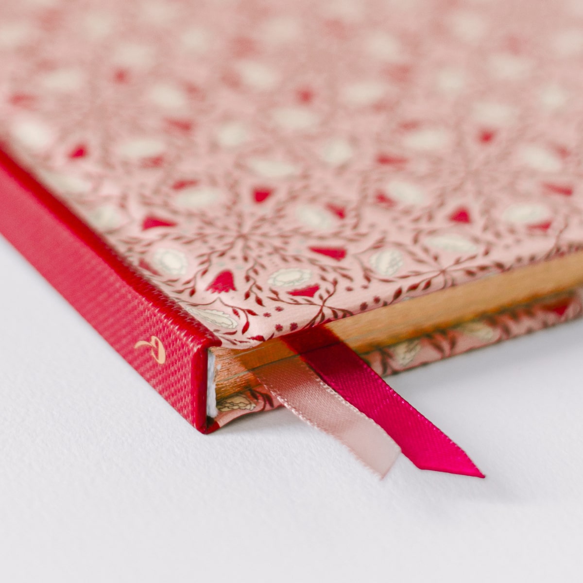 Good Juju Ink Pink Folk Pattern Pocket Journal (1 pc) - Satin bookmarks highlighted. 