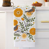 Close up of Gingiber Mums & Robins Tea Towel (1 pc) shown folded on kitchen countertop