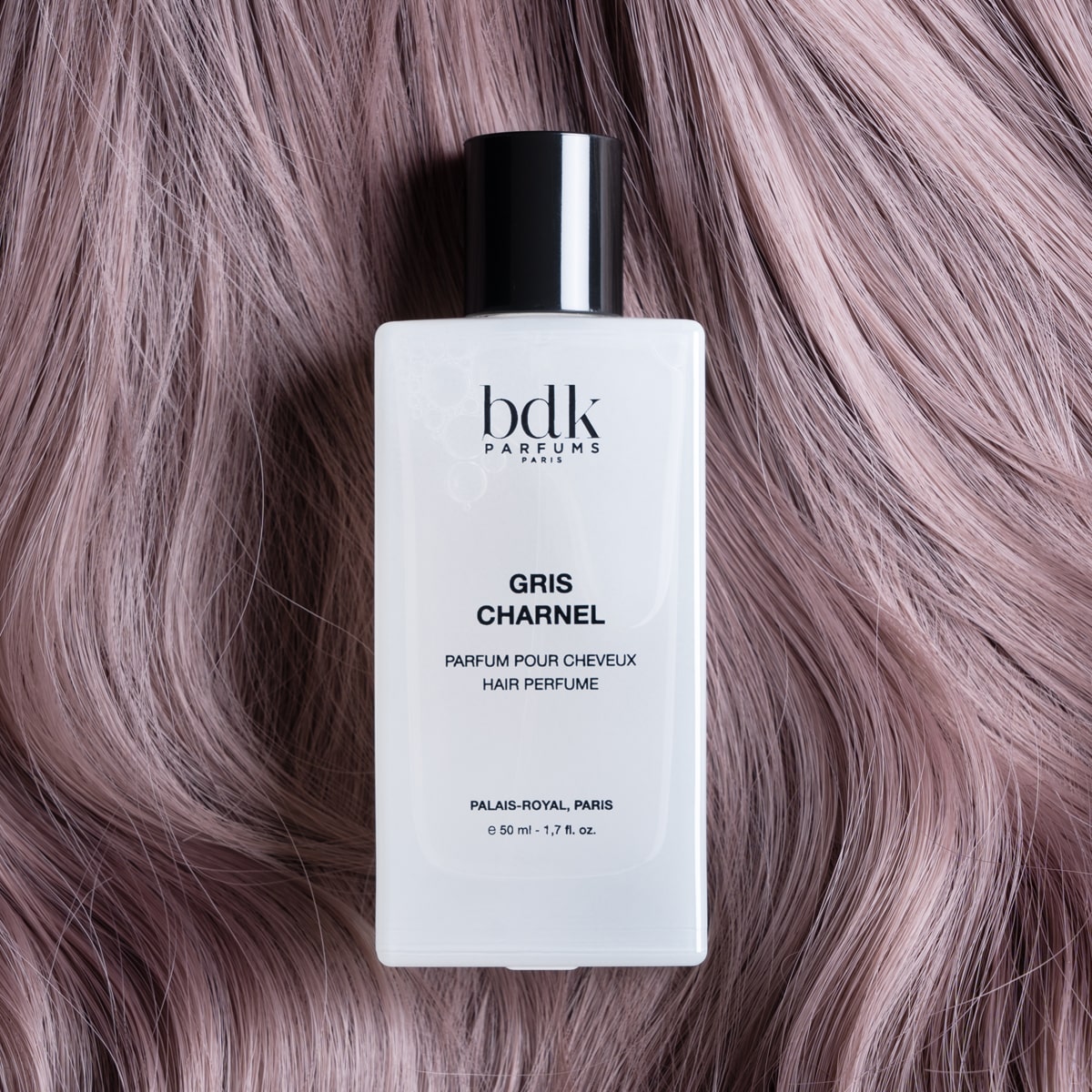 BDK Parfums Gris Charnel Hair Perfume (50 ml) - Product shown on hair. 