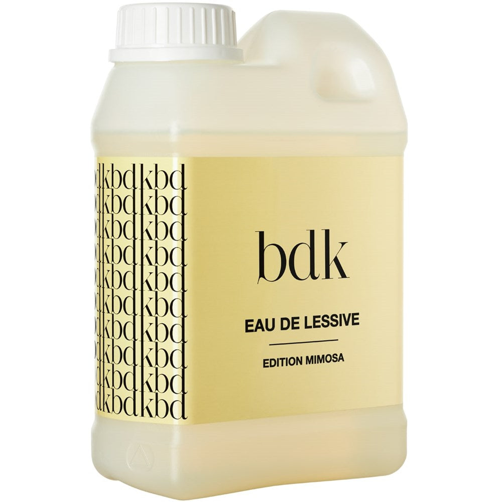 BDK Parfums Eau de Lessive Mimosa (1 liter) - product shown at angle.